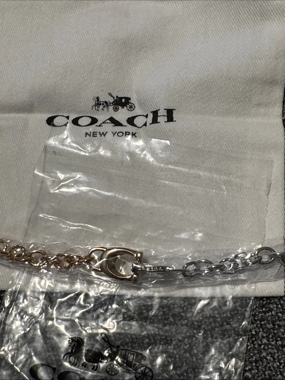 Gold and silver Coach bracelet